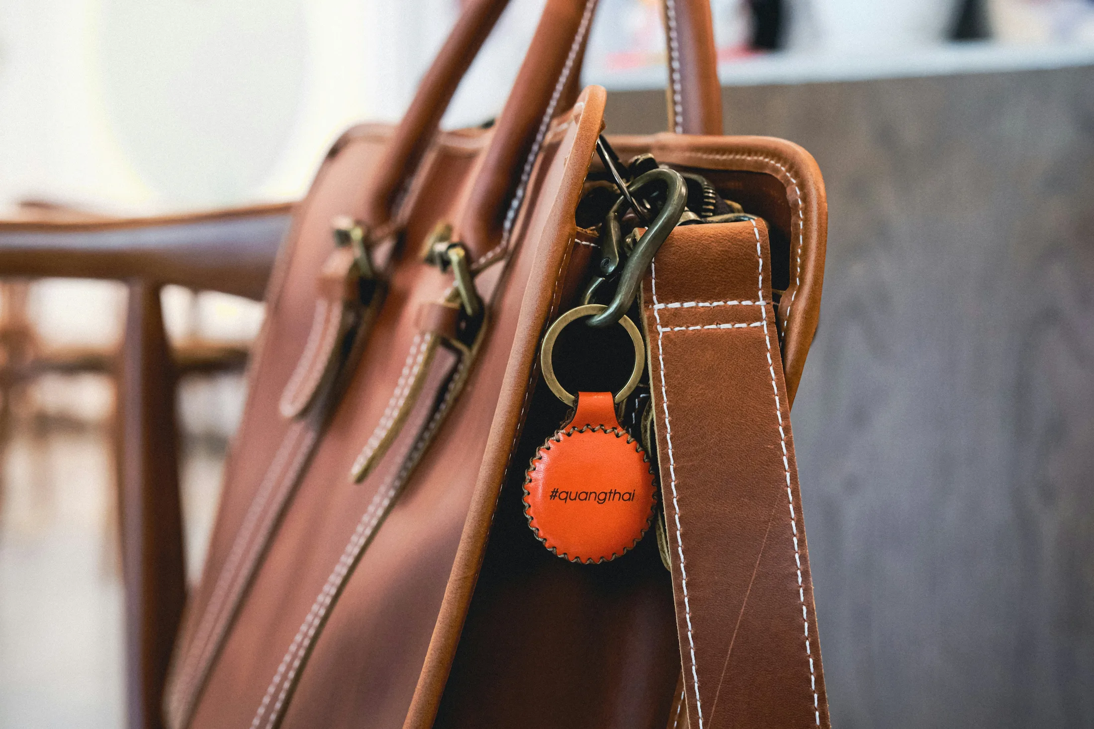 An accessory attached to a bag